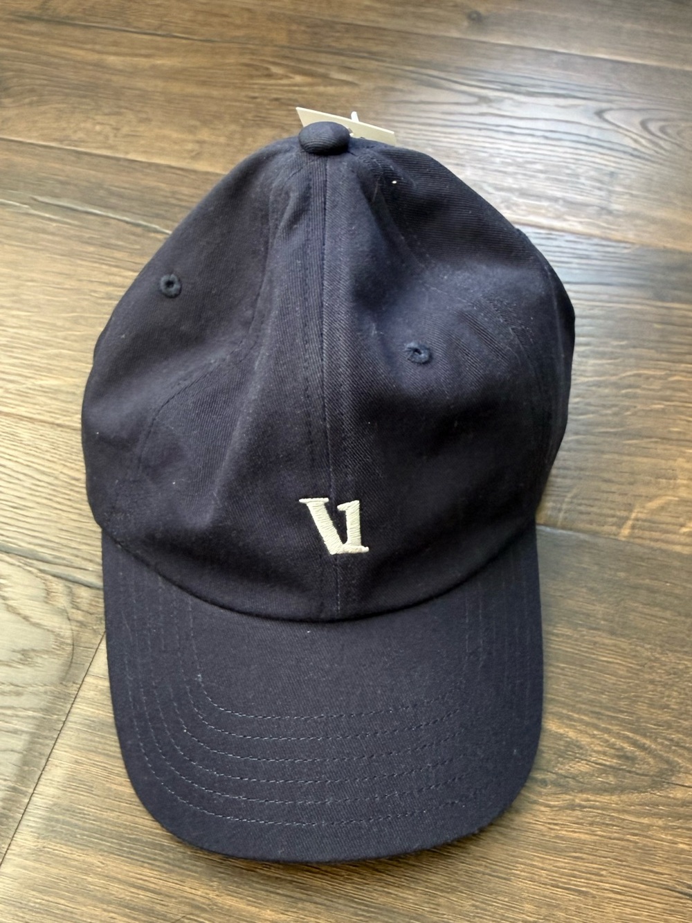 Vuori Navy Blue Baseball Cap with White "V1" Logo